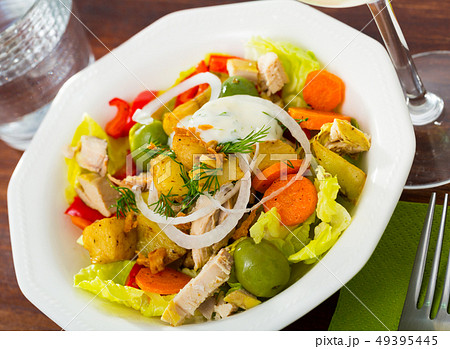 Warm salad with chicken and eggplant 49395445