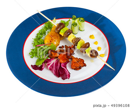 Tasty shish kebab from chicken hearts with avocado and fried chanterelles Tasty shish kebab from chicken hearts with avocado and fried chanterelles 49396108