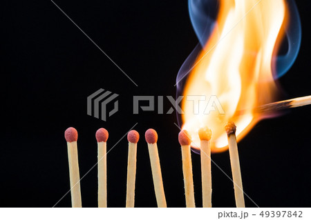 Line of burning matches Line of burning matches 49397842