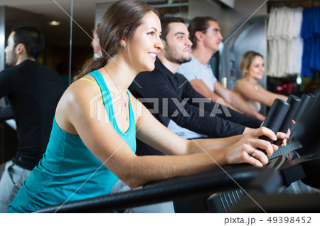 People training on treadmills People training on treadmills 49398452