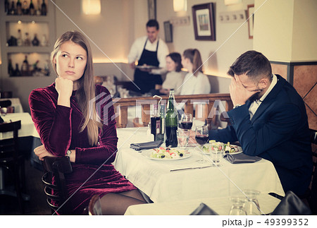 Couple quarreled in restaurant Couple quarreled in restaurant 49399352