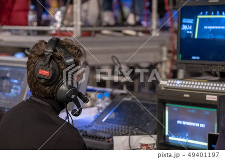 Video broadcast operator workis at business conference 49401197