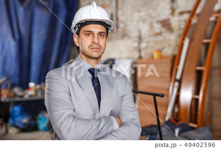 Strict manager at construction site 49402596