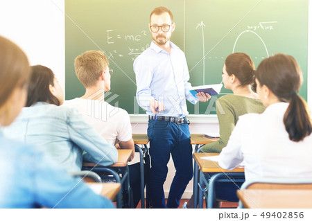 Male teacher giving lecture for students Male teacher giving lecture for students 49402856