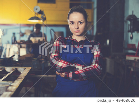 woman master is posing in workshop woman master is posing in workshop 49403620
