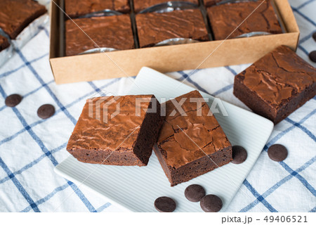 Close up sweet chocolate brownie on tablecloth Close up sweet chocolate brownie on tablecloth 49406521