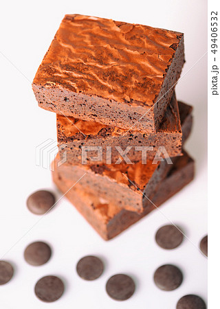 Close up sweet chocolate brownie on white Close up sweet chocolate brownie on white 49406532