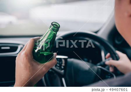 Asian men are breaking the traffic rules by Asian men are breaking the traffic rules by 49407601