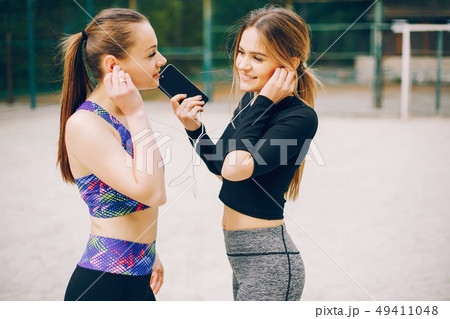 Sports girls in a park  49411048