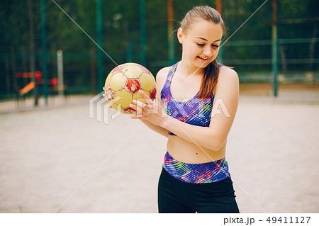 Sports girl in a park  49411127