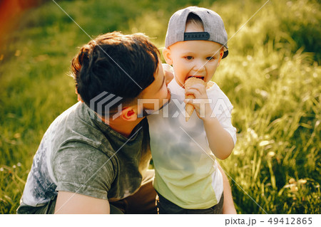 Father with son in a park Father with son in a park 49412865