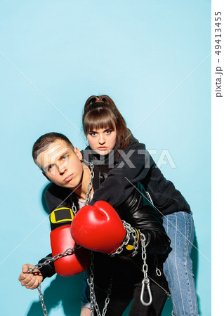 Close up fashion portrait of two young pretty hipster teens Close up fashion portrait of two young pretty hipster teens 49413455