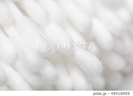 White eared cotton swabs as a background 49418009