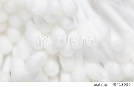 White eared cotton swabs as a background White eared cotton swabs as a background 49418039