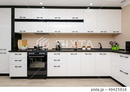 Modern black and white kitchen 49425916
