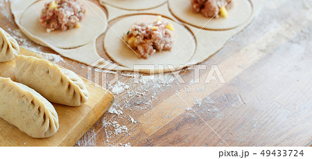 Preparation of dumplings manti Preparation of dumplings manti 49433724