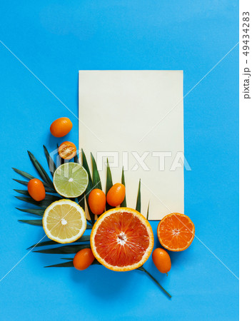 Citrus fruits on a blue background 49434283