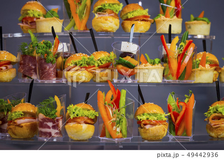 Mini canapes with cheese salads meat and seafood i 49442936