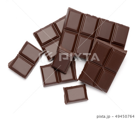 Dark organic chocolate pieces isolated on white background 49450764