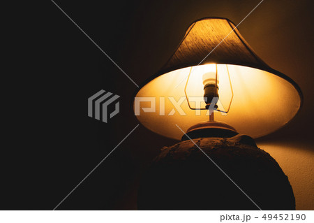 Livingroom lamp at night with dark background Livingroom lamp at night with dark background 49452190