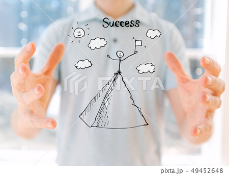 Standing on the top of a mountain with young man 49452648