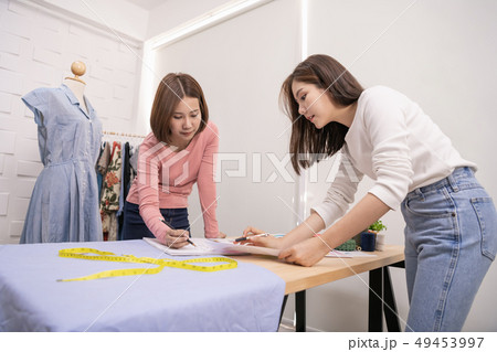 Designer concept. Tailors are helping to work 49453997