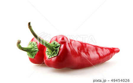 Close-Up Of Red Chili Pepper Against White Close-Up Of Red Chili Pepper Against White 49454026