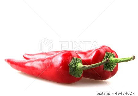 Close-Up Of Red Chili Pepper Against White Close-Up Of Red Chili Pepper Against White 49454027