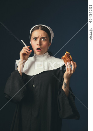 Medieval young woman as a nun Medieval young woman as a nun 49454231