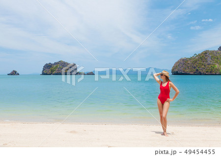 Young attractive woman relax on the sea beach Young attractive woman relax on the sea beach 49454455