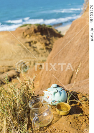Chinese tea ceremony with porcelain teapot, clay Chinese tea ceremony with porcelain teapot, clay 49455276