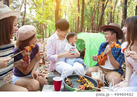 happy young friends group enjoying picnic party 49460482