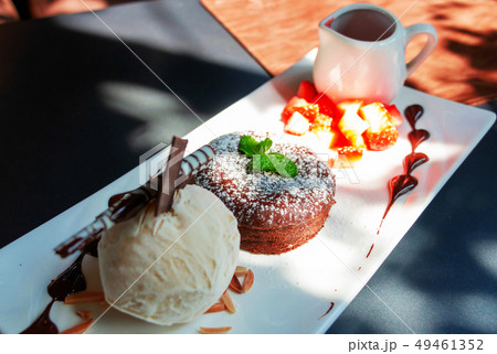 chocolate lava cake on white plate 49461352