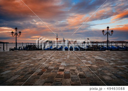 Gondola and San Giorgio Maggiore island sunrise 49463088