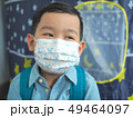 Little boy wearing protective mask protection from 49464097