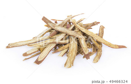 Sliced liquorice root on white. Sliced liquorice root on white. 49466324