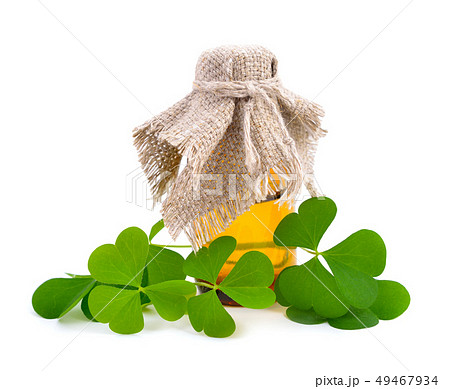 Wood-sorrel leawes with pharmaceutical bottle. 49467934
