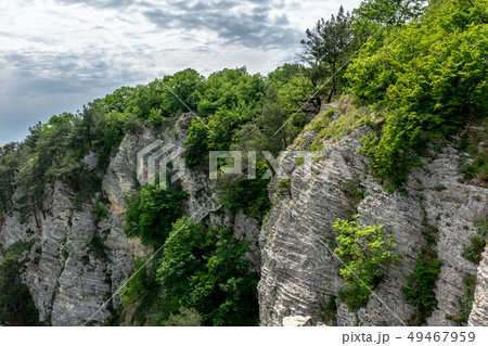 Mountain with a steep rocky slope 49467959