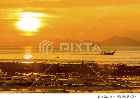 Silhouette of boat at sunset in West Railay, Thailand 49469707