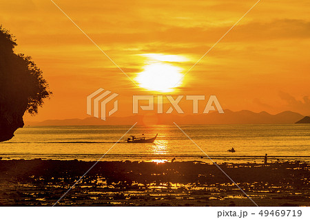 Silhouette of boat at sunset in West Railay, Thailand 49469719