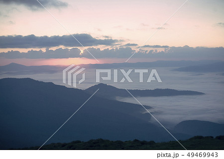 Mountains at sunrise in the Carpathian Mountain Range, Dragobrat, Ukraine Mountains at sunrise in the Carpathian Mountain Range, Dragobrat, Ukraine 49469943
