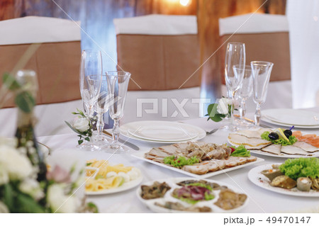 Food and place setting during wedding 49470147