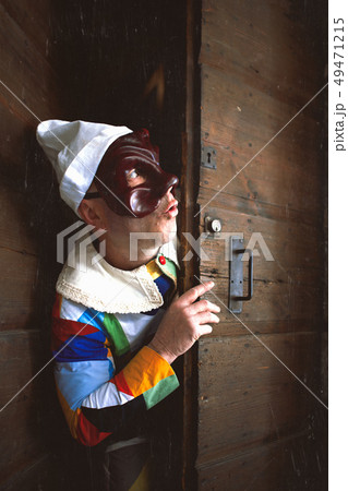 The mask of Arlecchino. Look out the door 49471215