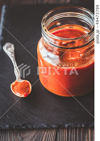 Barbecue sauce in the glass jar 49473799
