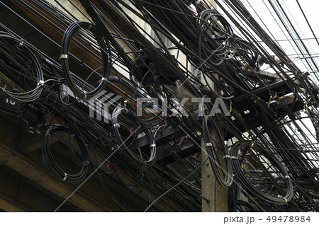 Messy high voltage electric wire in city Messy high voltage electric wire in city 49478984