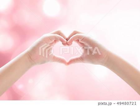 Heart-shape hand gesture of kid body language  49480721