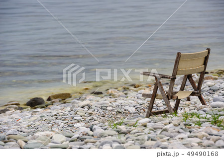 old wooden foldable chair at the beach 49490168
