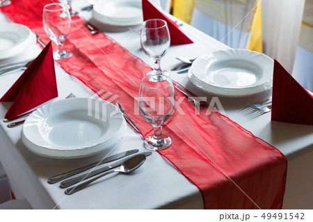 Large dining hall with tables set up 49491542