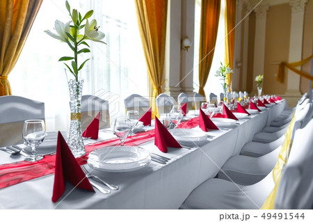 Large dining hall with tables set up 49491544