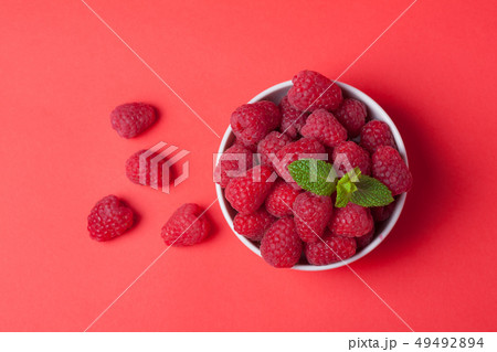 Bowl with fresh raspberries. Bowl with fresh raspberries. 49492894